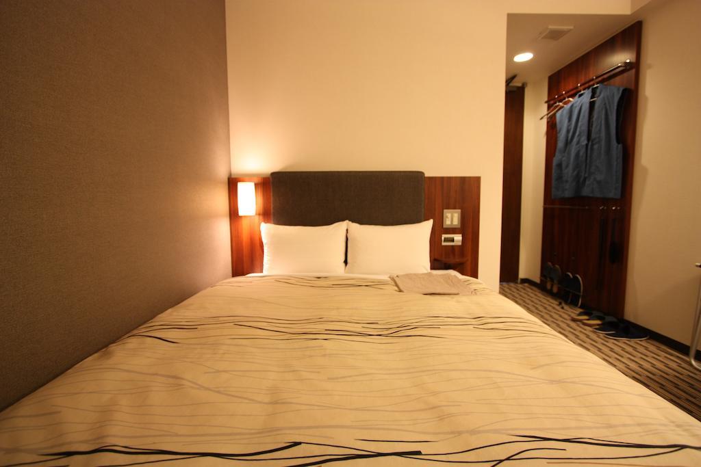 Uozu Manten Hotel Ekimae Номер фото